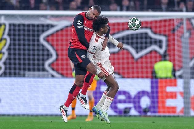 11 03 2025, Football, UEFA Champions League, Bayer 04 Leverkusen FC Bayern Munich, Round of 16 second leg, BayArena, Season 2024 2025 Jonathan Tah Bayer04 Leverkusen 4 in duel against Kingsley Coman FC Bayern 11 DFB regulations prohibit any use of photographs as image sequences and or quasi video North Rhine-Westphalia Germany