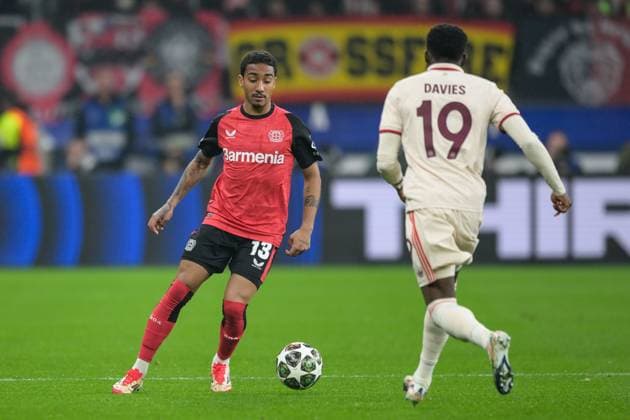 Soccer, UEFA Champions League, 20250311, Bayer 04 Leverkusen FC Bayern Munich Pictured from l ARTHUR 13 Leverkusen , Alphonso DAVIES 19 Bayern Leverkusen BayArena Nordrhein Westfalen Germany Copyright: Passion2Press MarkusxFischerx