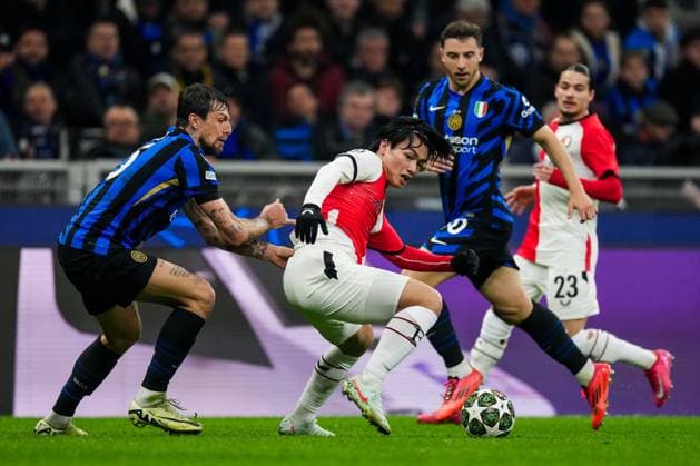 UEFA Champions League: FC Internationale Milan v Feyenoord Milan - Francesco Acerbi of FC Inter Milan, Ayase Ueda of Feyenoord during the 2nd leg of the round of 16 of new format of the Champions League 2024 2025. The match is set between FC Internationale Milan and Feyenoord at Giuseppe Meazza San Siro on 11 March 2025 in Milan, Italy. Copyright: xTomxBodex