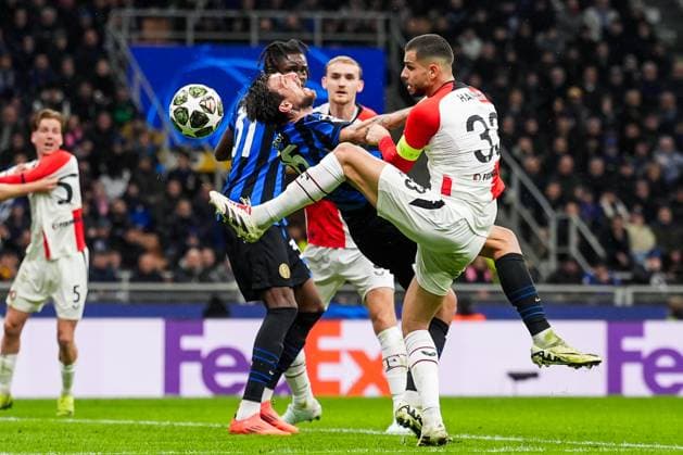 UEFA Champions League: FC Internationale Milan v Feyenoord Milan - Francesco Acerbi of FC Inter Milan, David Hancko of Feyenoord during the 2nd leg of the round of 16 of new format of the Champions League 2024 2025. The match is set between FC Internationale Milan and Feyenoord at Giuseppe Meazza San Siro on 11 March 2025 in Milan, Italy. Copyright: xTomxBodex