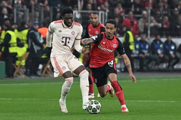 11 03 2025, xsltx, Football UEFA Champions League, Bayer 04 Leverkusen Bayern Munich v l Alphonso Davies Muenchen, 19 , Arthur Leverkusen, 13 duel, duel, fight, tackle DFL DFB REGULATIONS PROHIBIT ANY USE OF PHOTOGRAPHS as IMAGE SEQUENCES and or QUASI VIDEO Leverkusen