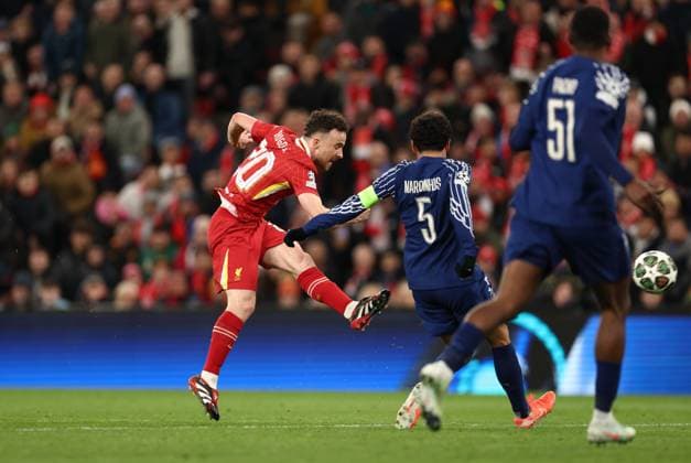 Diogo Jota of Liverpool shoots at goal. Liverpool v Paris Saint-Germain, UEFA Champions League, Round of 16, Second Leg, Football, Anfield, Liverpool, UK - 11 Mar 2025 EDITORIAL USE ONLY No use with unauthorised audio, video, data, fixture lists, club league logos or live services. Online in-match use limited to 120 images, no video emulation. No use in betting, games or single club league player publications. Copyright: xRyanxBrowne Shutterstockx 15188180bh