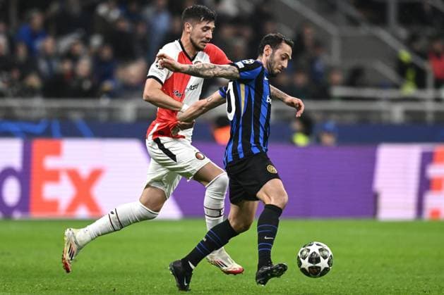 Db Milano 11 03 2025 - Champions League Inter-Feyenoord foto Daniele Buffa Image nella foto: Jakub Moder-Hakan Calhanoglu 