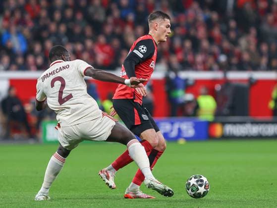 March 11, 2025, Leverkusen, Nrw, Germany: DAYOT UPAMECANO (Bayern MoÂ¼nchen, 2) and PATRICK SCHICK (Bayer 04 Leverkusen, 14) fights for ball, during the UEFA Champions League round of 16, 2nd leg match between Bayer 04 Leverkusen and Bayern MoÂ¼nchen at the BayArena Stadium. Leverkusen Germany - ZUMAb275 20250311_zsp_b275_011 Copyright: xGabrielxBoiax