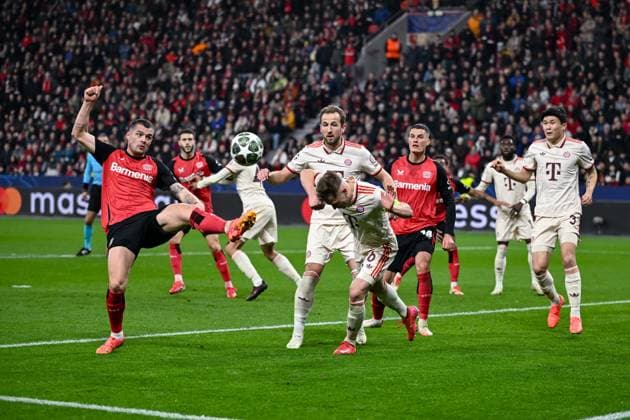 11 03 2025, Football UEFA Champions League 2024 2025, Round of 16, Bayer 04 Leverkusen FC Bayern Munich, in the BayArena, Granit Xhaka Bayer Leverkusen , Joshua Kimmich FC Bayern Munich DFL and DFB regulations prohibit any use of photographs as image sequences and or quasi video