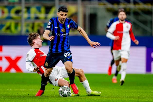 Feyenoord Rotterdam defender Gijs Smal, FC Internazionale Milan forwarder Mehdi Taremi during the match Inter Feyenoord at the San Siro Stadium for the UEFA Champions League Round of 16 2st leg season 2024 2025 in MILAN, Italia on 11 march 2025, photo by Marcel van Dorst EYE4images DeFodi Images