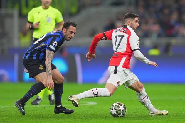 Inter Milan s Hakan Calhanoglu during the Uefa Champions League soccer match between Inter and Feyenoord at the San Siro Stadium in Milan, north Italy - Tuesday , March 11 , 2025. - Soccer .  Copyright: xSpada LaPressex