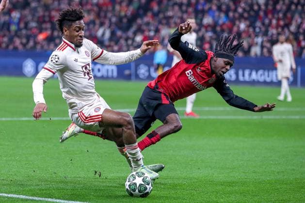 11 03 2025, Football, UEFA Champions League, Bayer 04 Leverkusen FC Bayern München, Round of 16 second leg, BayArena, Season 2024 2025 Kingsley Coman FC Bayern 11 in duel against Jeremie Frimpong Bayer04 Leverkusen 30 DFB regulations prohibit any use of photographs as image sequences and or quasi video Nordrhein Westfalen Germany