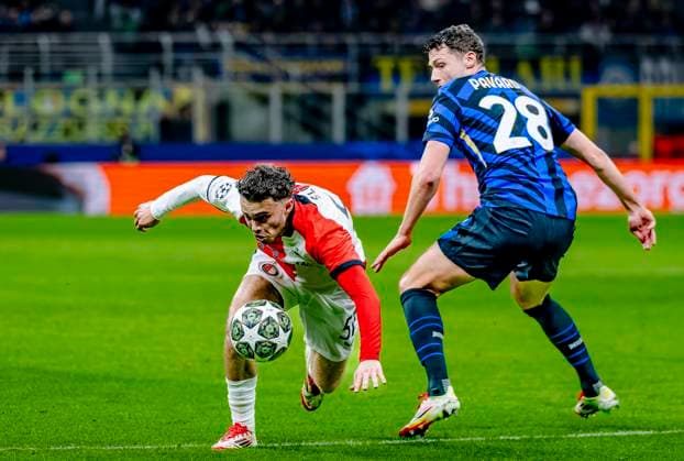 Feyenoord Rotterdam forwarder Aymen Sliti, FC Internazionale Milan defender Benjamin Pavard during the match Inter Feyenoord at the San Siro Stadium for the UEFA Champions League Round of 16 2st leg season 2024 2025 in MILAN, Italia on 11 march 2025, photo by Marcel van Dorst EYE4images DeFodi Images