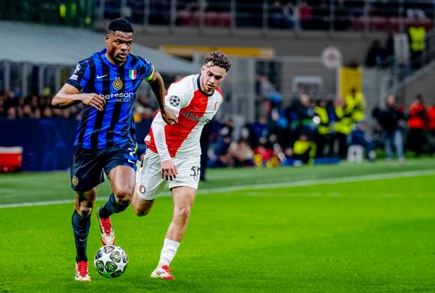 FC Internazionale Milan defender Denzel Dumfries, Feyenoord Rotterdam forwarder Aymen Sliti during the match Inter Feyenoord at the San Siro Stadium for the UEFA Champions League Round of 16 2st leg season 2024 2025 in MILAN, Italia on 11 march 2025, photo by Marcel van Dorst EYE4images DeFodi Images