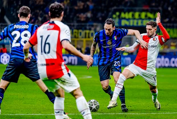 FC Internazionale Milan defender Hakan Calhanoglu, Feyenoord Rotterdam forwarder Luka Ivanusec during the match Inter Feyenoord at the San Siro Stadium for the UEFA Champions League Round of 16 2st leg season 2024 2025 in MILAN, Italia on 11 march 2025, photo by Marcel van Dorst EYE4images DeFodi Images