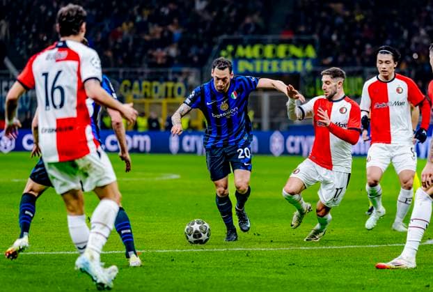 FC Internazionale Milan defender Hakan Calhanoglu, Feyenoord Rotterdam forwarder Luka Ivanusec during the match Inter Feyenoord at the San Siro Stadium for the UEFA Champions League Round of 16 2st leg season 2024 2025 in MILAN, Italia on 11 march 2025, photo by Marcel van Dorst EYE4images DeFodi Images