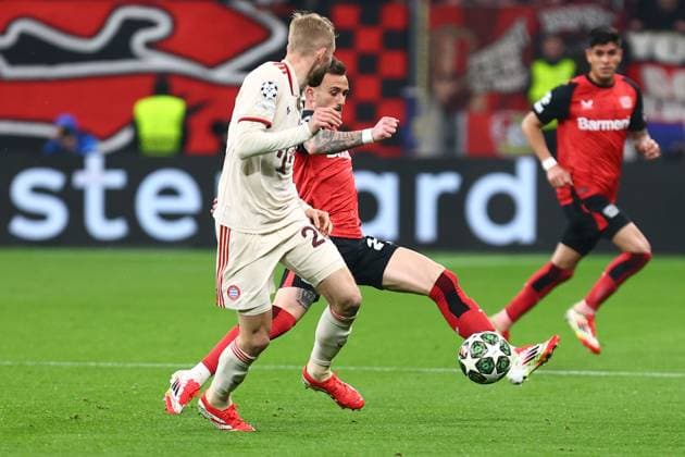 Aleix Garcia 24 Bayer 04 Leverkusen in duel, action, with Konrad Laimer 27 FC Bayern Muenchen Bayer 04 Leverkusen vs FC Bayern Muenchen, Football, UEFA Champions League, Round of 16, second leg, Season 2024 2025, 11 03 2025 Photo kolbert press Ant Palmer BayArena NRW Germany Copyright: xkolbert-press AntxPalmerx