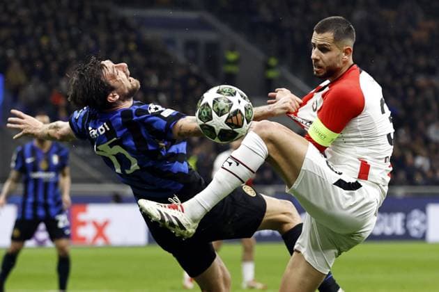 Sport Bilder des Tages MILAN - (l-r) Francesco Acerbi of FC Internazionale Milano, David Hancko of Feyenoord during the UEFA Champions League match between Internazionale Milano and Feyenoord at the San Siro stadium on March 11, 2025 in Milan, italy. ANP MAURICE VAN STEEN UEFA Champions League 2024 25 Round of 16 Second Leg 2024 25 xVIxANPxSportx xxANPxIVx 522143570 originalFilename: 522143570.jpg