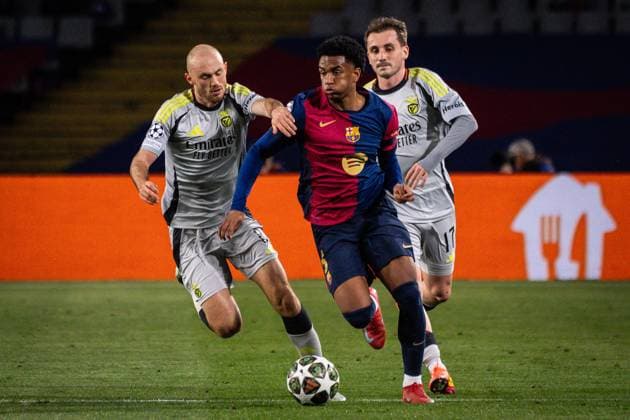 March 11, 2025, Barcelona, Spain, Spain: Frederik AURSNES of Benfica, Pedro GONZALEZ LOPEZ (Pedri) of Barcelona and Karem AKTURKOGLU of Benfica during the UEFA Champions League match between FC Barcelona, Barca and SL Benfica at Estadi Olimpic Lluis Companys on March 11, 2025 in Barcelona, Spain. Barcelona Spain - ZUMAm308 20250311_zsp_m308_017 Copyright: xMatthieuxMirvillex