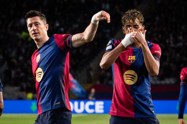 March 11, 2025, Barcelona, Spain, Spain: Lamine YAMAL of Barcelona celebrate his goal with Robert LEWANDOWSKI of Barcelona during the UEFA Champions League match between FC Barcelona, Barca and SL Benfica at Estadi Olimpic Lluis Companys on March 11, 2025 in Barcelona, Spain. Barcelona Spain - ZUMAm308 20250311_zsp_m308_024 Copyright: xMatthieuxMirvillex