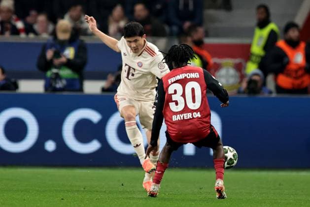 Min jae Kim FC Bayern Munich and Jeremie Frimpong Bayer 04 Leverkusen in the round of 16 second leg of the 2024 UEFA Champions League season 25 Bayer Leverkusen FC Bayern Munich Copyright Thomas Pakusch Copyright: Thomas Pakusch