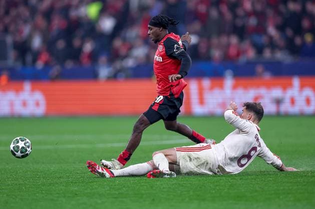 11 03 2025, Football, UEFA Champions League, Bayer 04 Leverkusen FC Bayern Munich, Round of 16 second leg, BayArena, Season 2024 2025 Jeremie Frimpong Bayer04 Leverkusen 30 in duel against Leon Goretzka FC Bayern 8 DFB regulations prohibit any use of photographs as image sequences and or quasi video Nordrhein Westfalen Germany