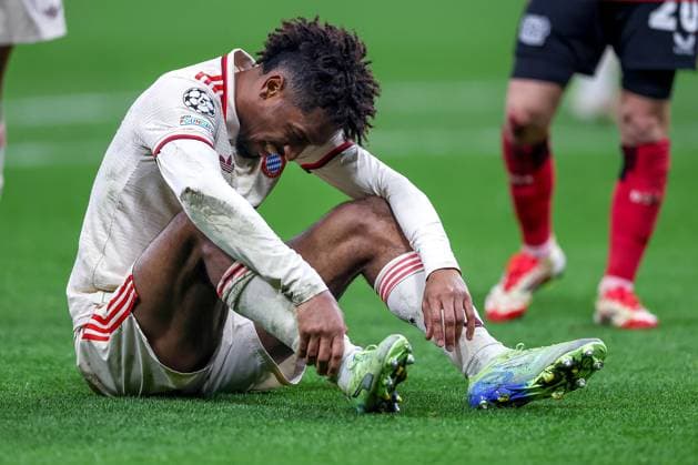 11 03 2025, Football, UEFA Champions League, Bayer 04 Leverkusen FC Bayern München, Round of 16 second leg, BayArena, Season 2024 2025 Kingsley Coman FC Bayern 11 is injured on the pitch and has to be substituted with pain Injured ankle DFB regulations prohibit any use of photographs as image sequences and or quasi video North Rhine-Westphalia Germany
