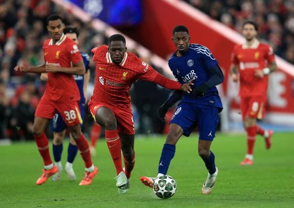 11th March 2025; Anfield, Liverpool, Merseyside, England; Champions League Last 16, Second Leg Football, Liverpool versus Paris Saint Germain; Ousmane Dembele of Paris Saint Germain takes on Ibrahima Konate of Liverpool  ActionPlus12758928 DavidxBlunsden