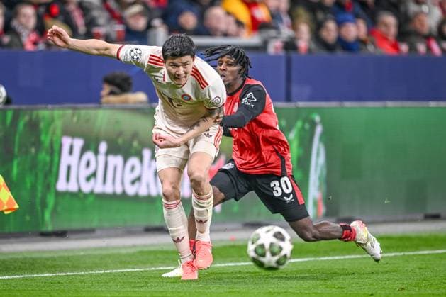 Leverkusen, Germany, 11 03 2025 Minjae Kim FC Bayern Muenchen and Jeremie Frimpong Bayer 04 Leverkusen battle for the ball during the UEFA Champions League 2024 25 Round of 16 Second Leg match between Bayer 04 Leverkusen and FC Bayern München at BayArena on March 11, 2025 in Leverkusen, Germany Photo by Harry Langer DeFodi Images