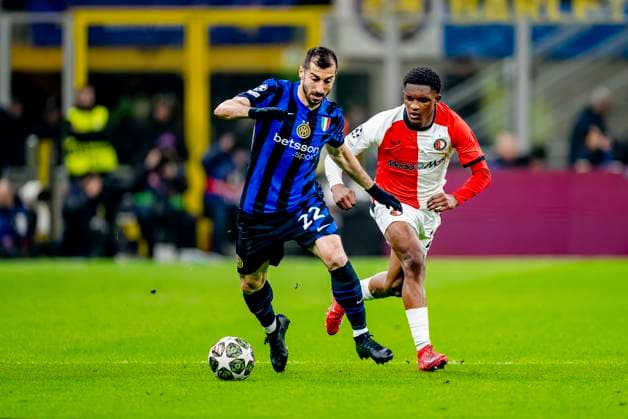 FC Internazionale Milan defender Henrikh Mkhitaryan, Feyenoord Rotterdam midfielder Givairo Read during the match Inter Feyenoord at the San Siro Stadium for the UEFA Champions League Round of 16 2st leg season 2024 2025 in MILAN, Italia on 11 march 2025, photo by Marcel van Dorst EYE4images DeFodi Images