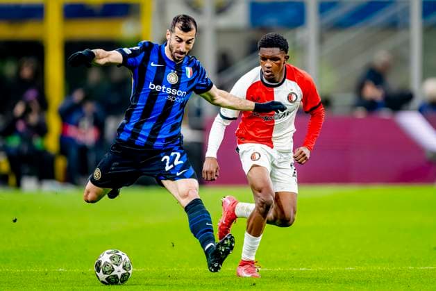 FC Internazionale Milan defender Henrikh Mkhitaryan, Feyenoord Rotterdam midfielder Givairo Read during the match Inter Feyenoord at the San Siro Stadium for the UEFA Champions League Round of 16 2st leg season 2024 2025 in MILAN, Italia on 11 march 2025, photo by Marcel van Dorst EYE4images DeFodi Images