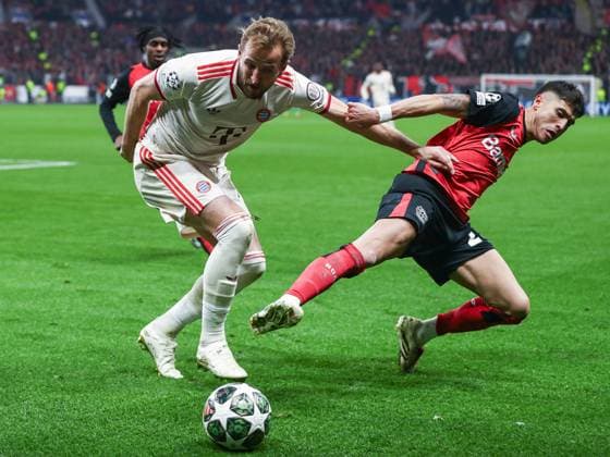 March 11, 2025, Leverkusen, Nrw, Germany: PIERO HINCAPIE REINA (Bayer 04 Leverkusen, 03) and HARRY KANE (Bayern MoÂ¼nchen, 9) fights for ball, during the UEFA Champions League round of 16, 2nd leg match between Bayer 04 Leverkusen and Bayern MoÂ¼nchen at the BayArena Stadium. Leverkusen Germany - ZUMAb275 20250311_zsp_b275_027 Copyright: xGabrielxBoiax
