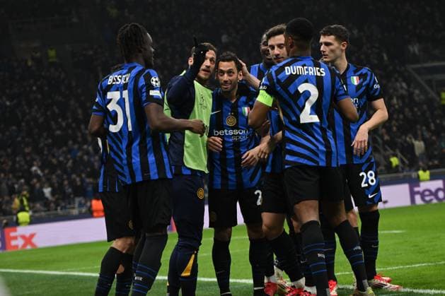Hakan Calhanoglu of Fc Inter celebrating after a goal during the UEFA Champions League round of 16 second leg match between Inter FC Internazionale and Feyenoord Rotterdam, on 10 of March 2025, at Giuseppe Meazza San Siro Siro stadium in Milan, Italy  Copyright: xTizianoxBallabio IPAxSportx xipa-agency.netx xx IPA_55224973 IPA_Agency_IPA55224973