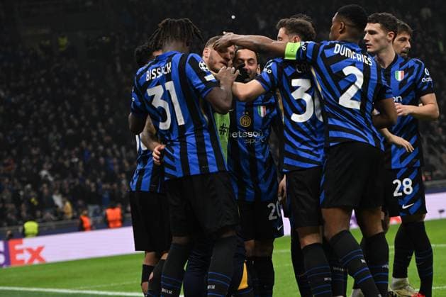 Hakan Calhanoglu of Fc Inter celebrating after a goal during the UEFA Champions League round of 16 second leg match between Inter FC Internazionale and Feyenoord Rotterdam, on 10 of March 2025, at Giuseppe Meazza San Siro Siro stadium in Milan, Italy  Copyright: xTizianoxBallabio IPAxSportx xipa-agency.netx xx IPA_55224974 IPA_Agency_IPA55224974