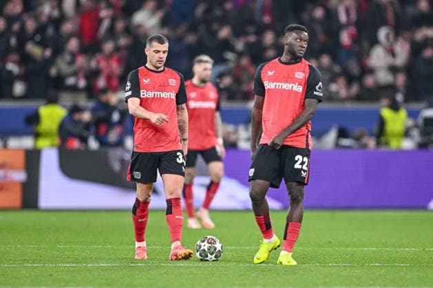 Leverkusen, Germany, 11 03 2025 Granit Xhaka Bayer 04 Leverkusen and Victor Boniface Bayer 04 Leverkusen look dejected during the UEFA Champions League 2024 25 Round of 16 Second Leg match between Bayer 04 Leverkusen and FC Bayern München at BayArena on March 11, 2025 in Leverkusen, Germany Photo by Harry Langer DeFodi Images