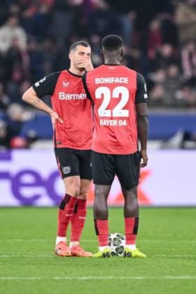 Leverkusen, Germany, 11 03 2025 Granit Xhaka Bayer 04 Leverkusen and Victor Boniface Bayer 04 Leverkusen look dejected during the UEFA Champions League 2024 25 Round of 16 Second Leg match between Bayer 04 Leverkusen and FC Bayern München at BayArena on March 11, 2025 in Leverkusen, Germany Photo by Harry Langer DeFodi Images