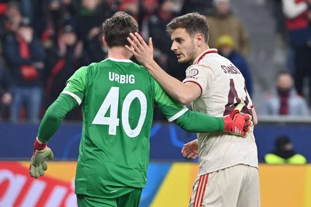 11 03 2025, xjrdrx, Football UEFA Champions League, Bayer 04 Leverkusen Bayern Munich v l Jonas Urbig Muenchen, 40 , Josip Stanisic Muenchen, 44 jubeln DFL DFB REGULATIONS PROHIBIT ANY USE OF PHOTOGRAPHS as IMAGE SEQUENCES and or QUASI VIDEO Leverkusen