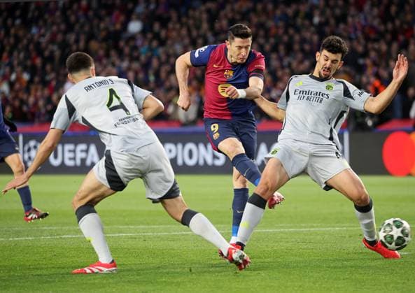 FC Barcelona, Barca v SL Benfica - UEFA Champions League 2024 25 Round of 16 Second Leg Robert Lewandowski, Tomas Araujo, and Antonio Silva play during the match between FC Barcelona and SL Benfica, corresponding to the second leg of the round of 16 of the UEFA Champions League, at the Lluis Companys Stadium in Barcelona, Spain, on March 11, 2025. Barcelona Barcelona Spain  Copyright: xUrbanandsportx originalFilename:urbanandsport-fcbarcel250311_np9TQ.jpg