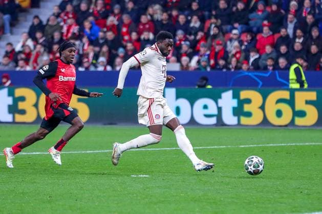 11 03 2025, Football, UEFA Champions League, Bayer 04 Leverkusen FC Bayern München, Round of 16 second leg, BayArena, Season 2024 2025 Goal kick to 2 0 by scorer Alphonso Davies FC Bayern 19 DFB regulations prohibit any use of photographs as image sequences and or quasi video North Rhine-Westphalia Germany