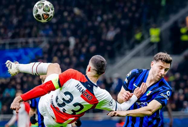 Feyenoord Rotterdam defender David Hancko, FC Internazionale Milan defender Carlos Augusto during the match Inter Feyenoord at the San Siro Stadium for the UEFA Champions League Round of 16 2st leg season 2024 2025 in MILAN, Italia on 11 march 2025, photo by Marcel van Dorst EYE4images DeFodi Images