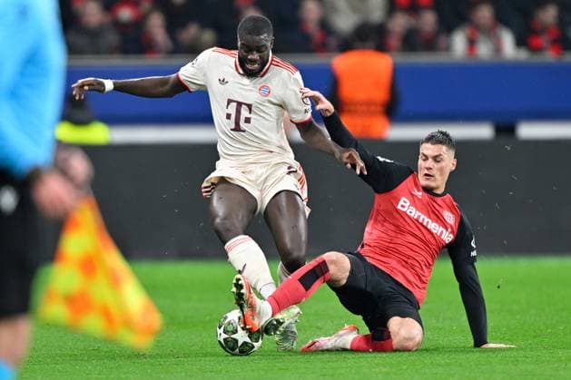 (250312) -- LEVERKUSEN, March 12, 2025 -- Patrik Schick (R) of Bayer 04 Leverkusen vies with Dayot Upamecano of Bayern Munich during the UEFA Champions League Round of 16 2nd leg football match between Bayer 04 Leverkusen and Bayern Munich in Leverkusen, Germany, March 11, 2025. (Photo by Xinhua) (SP)GERMANY-LEVERKUSEN-FOOTBALL-UEFA CHAMPIONS LEAGUE-LEVERKUSEN VS BAYERN MUNICH UlrichxHufnagel 