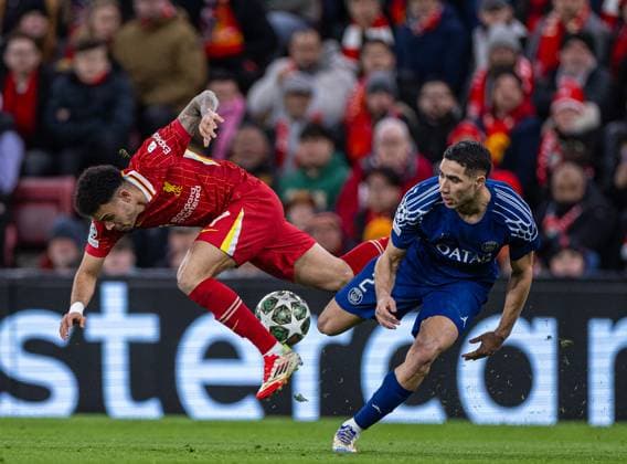Sport Bilder des Tages (250312) -- LIVERPOOL, March 12, 2025 -- Liverpool s Luis Diaz (L) is challenged by Paris Saint-Germain s Achraf Hakimi during the UEFA Champions League Round of 16 2nd Leg match between Liverpool FC and Paris Saint-Germain FC in Liverpool, Britain, on March 11, 2025. (SP)BRITAIN-LIVERPOOL-FOOTBALL-UEFA CHAMPIONS LEAGUE-LIVERPOOL FC VS PSG LixYing 