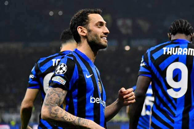11th March 2025; Stadio San Siro, Milan, Italy, Champions League Football, Last 16, Second Leg, Inter Milan versus Feyenoord; Hakan Calhanoglu of FC Internazionale celebrates his goal from a penalty kick for 2-1 in the 51st minute  ActionPlus12759202 BestxImages