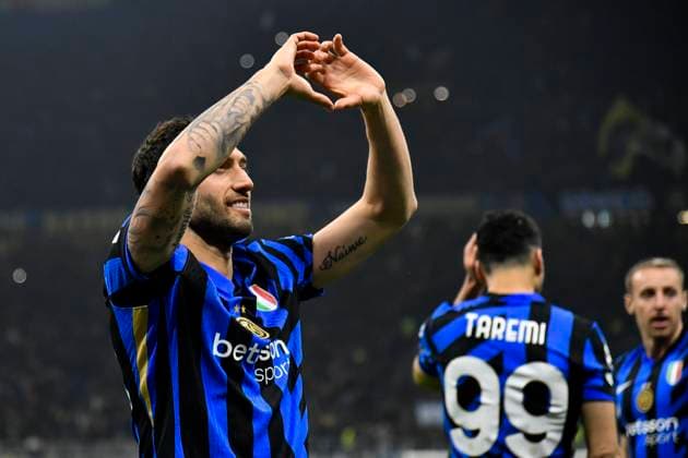 11th March 2025; Stadio San Siro, Milan, Italy, Champions League Football, Last 16, Second Leg, Inter Milan versus Feyenoord; Hakan Calhanoglu of FC Internazionale celebrates his goal from a penalty kick for 2-1 in the 51st minute  ActionPlus12759203 BestxImages