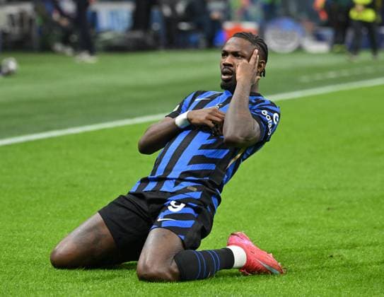 (250312) -- MILAN, March 12, 2025 -- Inter Milan s Marcus Thuram celebrates his goal during the round of 16 second leg match of UEFA Champions League between Inter Milan and Feyenoord in Milan, Italy, March 11, 2025. (Photo by Xinhua) (SP)ITALY-MILAN-FOOTBALL-UEFA CHAMPIONS LEAGUE-INTER MILAN VS FEYENOORD AlbertoxLingria 