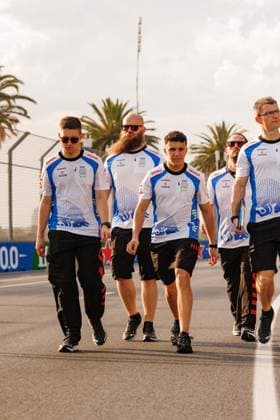 March 12, 2025, Melbourne, Victoria, Australia: Isack Hadjar of France (C) and the Visa Cash App Racing Bulls Formula One Team walks around the track ahead of the F1 Grand Prix of Australia at the Albert Park Grand Prix Circuit. Melbourne Australia - ZUMAs197 20250312_aaa_s197_063 Copyright: xGeorgexHitchensx