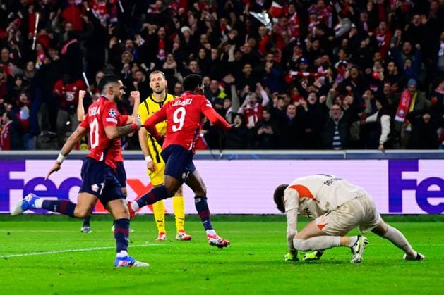 FOOTBALL : Lille vs Borussia Dortmund - Ligue des Champions - 12 03 2025 Jonathan David ( 9 - Lille ) celebrates after scoring during UEFA Champions League match between Lille OSC and Borussia Dortmund at Stade Pierre Mauroy on March 12, 2025 in Lille, France. ( Photo by Dante Badano PsnewZ ) - LilleFrance  Copyright: xDantexBadanox