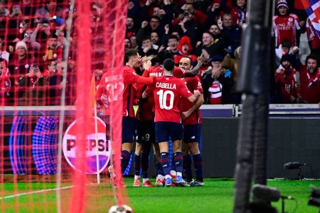 FOOTBALL : Lille vs Borussia Dortmund - Ligue des Champions - 12 03 2025 Jonathan David ( 9 - Lille ) celebrates with teammates during UEFA Champions League match between Lille OSC and Borussia Dortmund at Stade Pierre Mauroy on March 12, 2025 in Lille, France. ( Photo by Dante Badano PsnewZ ) - LilleFrance  Copyright: xDantexBadanox