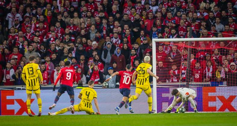 Lille, Germany 12th Mar 2025 Jonathan David Lille scores the goal for 1 0 against Gregor Kobel BvB OSC Lille Borussia Dortmund 12 03 2025