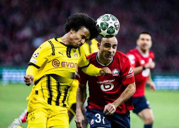 Lille, Stade Pierre Mauroy, 12 03 2025 Karim Adeyemi of Dortmund challenge Ismaily of Lille during the match of the Championsleague Round 16 between Lille OSC v Borussia Dortmund