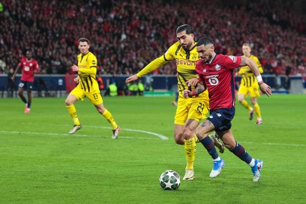 12 03 2025, UEFA Champions League, round of 16, Lille OSC Borussia Dortmund, f l Emre Can Borussia Dortmund , Remy Cabella LOSC Lille , Lille Stade Pierre Mauroy Decathlon Arena Paris xRHR PHOTO DEx Copyright: DennisxEwert RHR-FOTOx RHR-FOTO DE