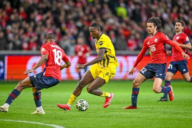 Lille, France, 12 03 2025 Bafode Diakite LOSC Lille , Serhou Guirassy BV Borussia Dortmund and Ayyoub Bouaddi LOSC Lille battle for the ball during the UEFA Champions League 2024 25 Round of 16 Second Leg match between LOSC Lille and Borussia Dortmund at Stade Pierre Mauroy on March 12, 2025 in Lille, France Photo by Harry Langer DeFodi Images