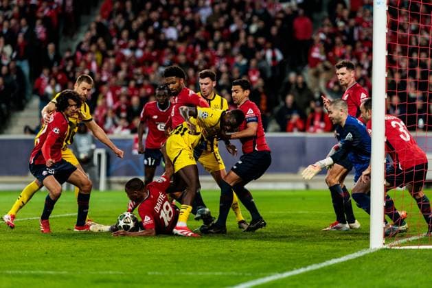 UEFA Champions League, LOSC Lille Borussia Dortmund 12 03 2025 Fight in penalty area Ayyoub Bouaddi LOSC Lille, 32 , Waldemar Anton Borussia Dortmund, 3 , Bafode Diakite LOSC Lille, 18 , Serhou Guirassy Borussia Dortmund, 9 , Benjamin Andre LOSC Lille, 21 , Lucas Chevalier LOSC Lille, 30 , Ismaily LOSC Lille, 31 UEFA Champions League round of 16 second leg, LOSC Lille Borussia Dortmund Lille, Stade Pierre Mauroy on 12 03 2025 Copyright: xBEAUTIFULxSPORTS Wunderlx