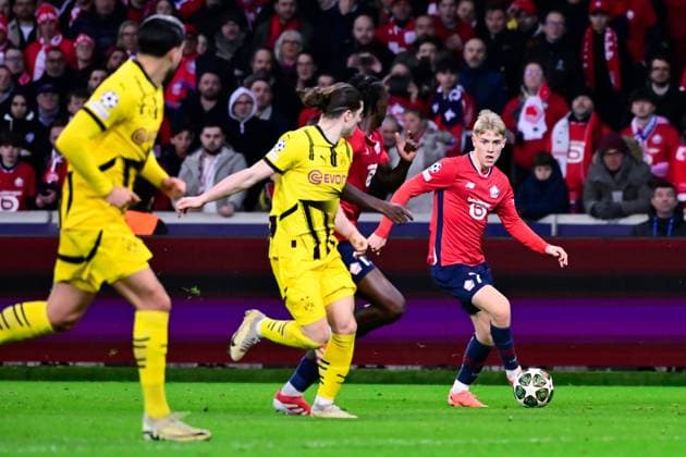 FOOTBALL : Lille vs Borussia Dortmund - Ligue des Champions - 12 03 2025 Hakon HARALDSSON ( 7 - Lille ) and Marcel Sabitzer ( 20 - Borussia Dortmund ) during UEFA Champions League match between Lille OSC and Borussia Dortmund at Stade Pierre Mauroy on March 12, 2025 in Lille, France. ( Photo by Dante Badano PsnewZ ) - LilleFrance  Copyright: xDantexBadanox